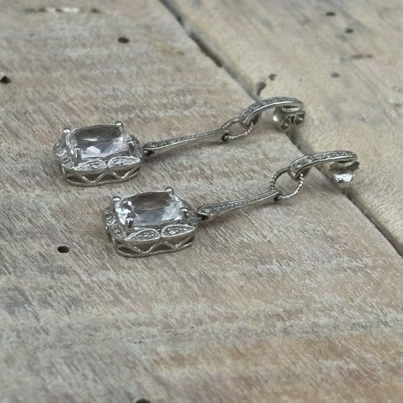 White Sapphires Set Into a 925 Sterling Silver Drop Earring Set. Items 355 - Picture 2 of 5